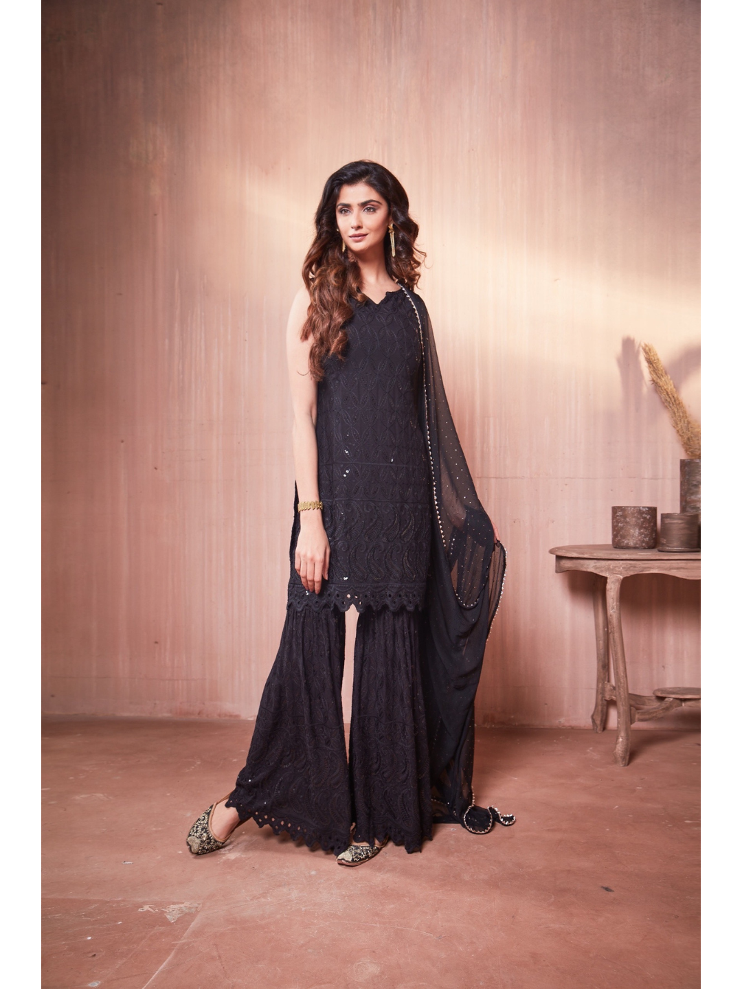 Nikita Sharma's Black Rayon Schiffly chikan Kurti embellished in sequence work with Gharara and Dupatta (3 Piece set) chikan kurti,  chikankari, lucknowi chikan, embroidery kurti, chikan, chikan kurta, lakhnavi kurti, chicken curry kurti, lucknowi chikankari kurti, lucknowi kurti with palazzo, chikan suit, chikankari kurta for women, chikankari kurta, chikankari kurta set, chikankari suit set, gharara, chikankari suits, hand crafted, lucknowi chikankari kurti, lucknowi kurti, lucknowi chikankari