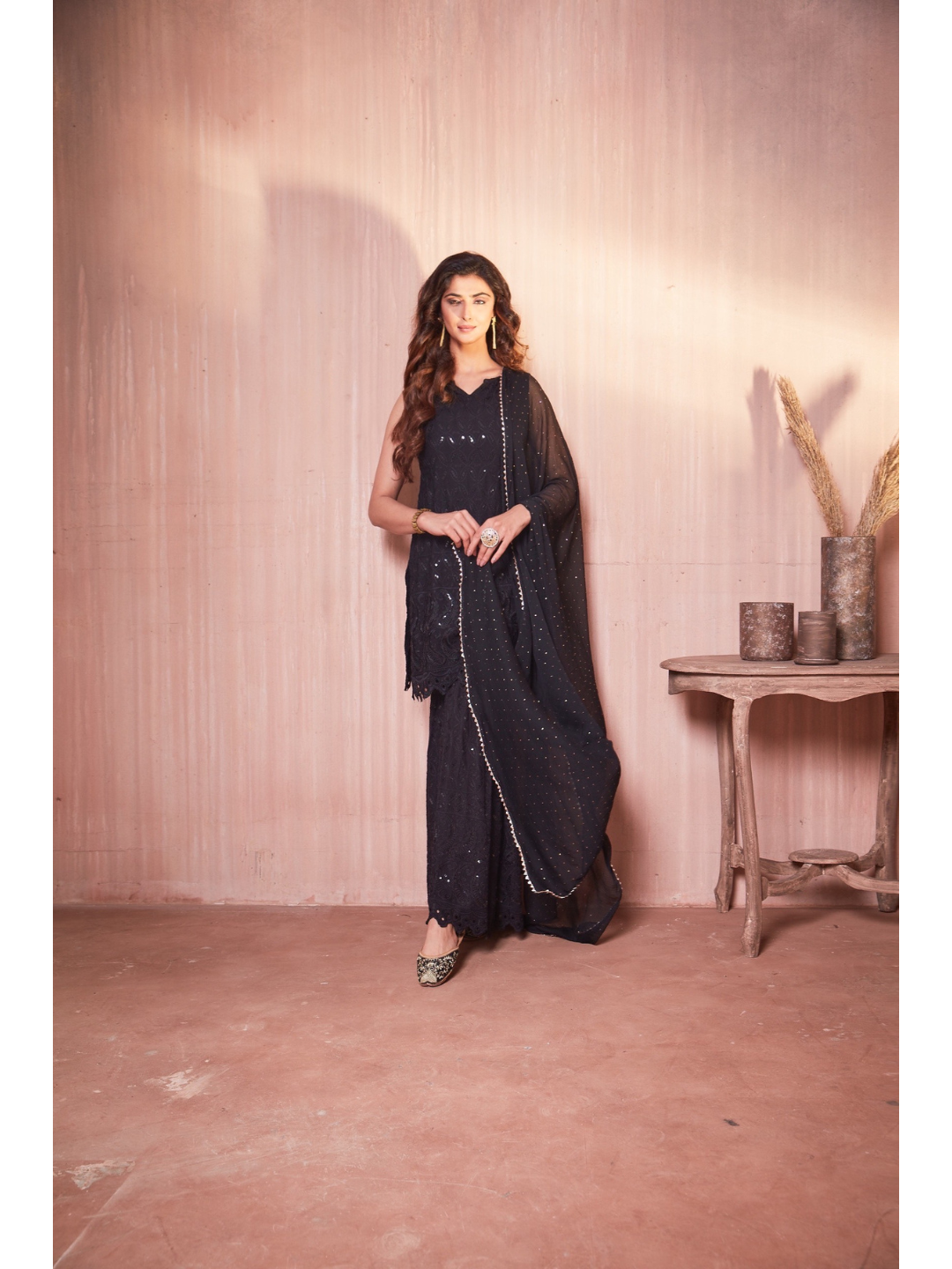 Nikita Sharma's Black Rayon Schiffly chikan Kurti embellished in sequence work with Gharara and Dupatta (3 Piece set) chikan kurti,  chikankari, lucknowi chikan, embroidery kurti, chikan, chikan kurta, lakhnavi kurti, chicken curry kurti, lucknowi chikankari kurti, lucknowi kurti with palazzo, chikan suit, chikankari kurta for women, chikankari kurta, chikankari kurta set, chikankari suit set, gharara, chikankari suits, hand crafted, lucknowi chikankari kurti, lucknowi kurti, lucknowi chikankari