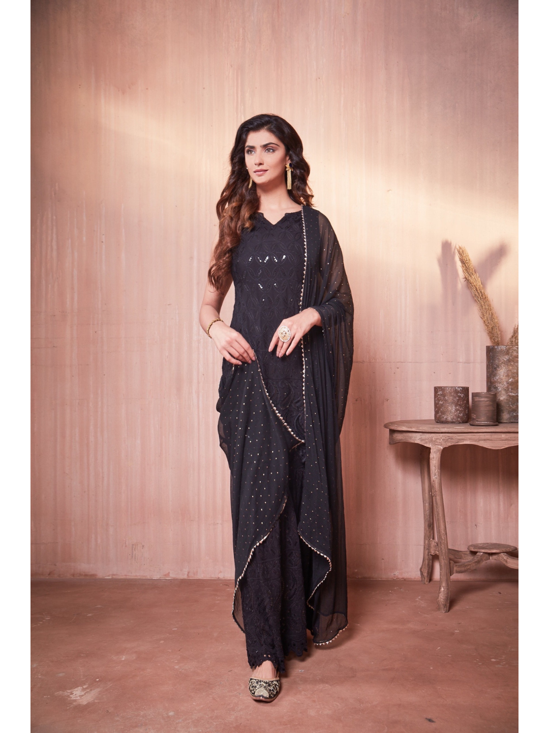 Nikita Sharma's Black Rayon Schiffly chikan Kurti embellished in sequence work with Gharara and Dupatta (3 Piece set) chikan kurti,  chikankari, lucknowi chikan, embroidery kurti, chikan, chikan kurta, lakhnavi kurti, chicken curry kurti, lucknowi chikankari kurti, lucknowi kurti with palazzo, chikan suit, chikankari kurta for women, chikankari kurta, chikankari kurta set, chikankari suit set, gharara, chikankari suits, hand crafted, lucknowi chikankari kurti, lucknowi kurti, lucknowi chikankari