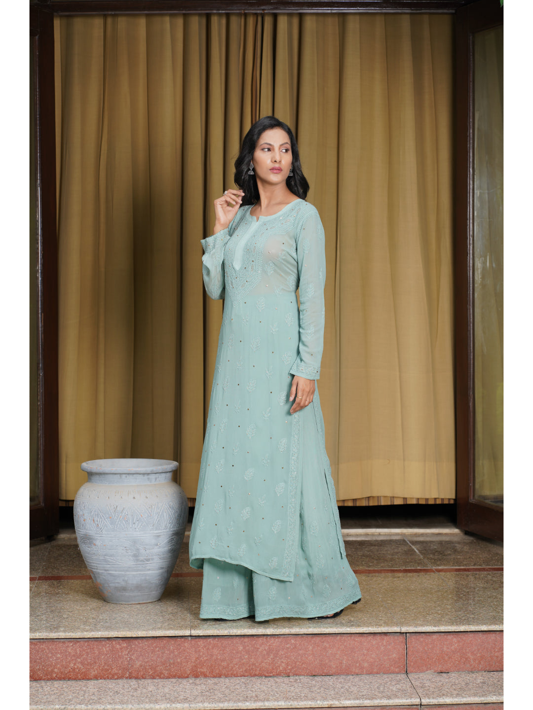 Saadgi hand embroidered chikankari pine green Mukaish rings work kurta with palazzo