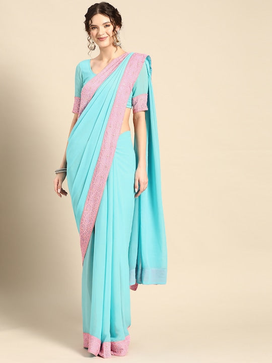This Saadgi Chikankari Bordered Pink & Blue Viscose Georgette Saree is designed with a machine chikankari border with gold zari work and a contrast lively color. It's perfect for both formal wear and family functions, and comes with an unstitched blouse. Crafted by the renowned Saadgi brand, this saree makes a perfect statement for every occasion. party wear sarees, organza sarees, chicken, chickenkari, chicken saree, lucknowi chikankari saree, saree